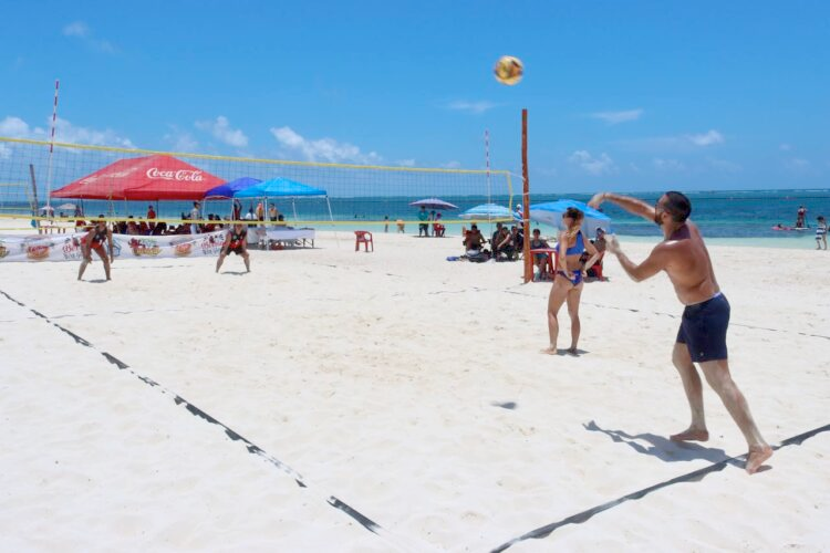 Beach volleyball courts set up on the sand in Puerto Morelos, Quintana Roo