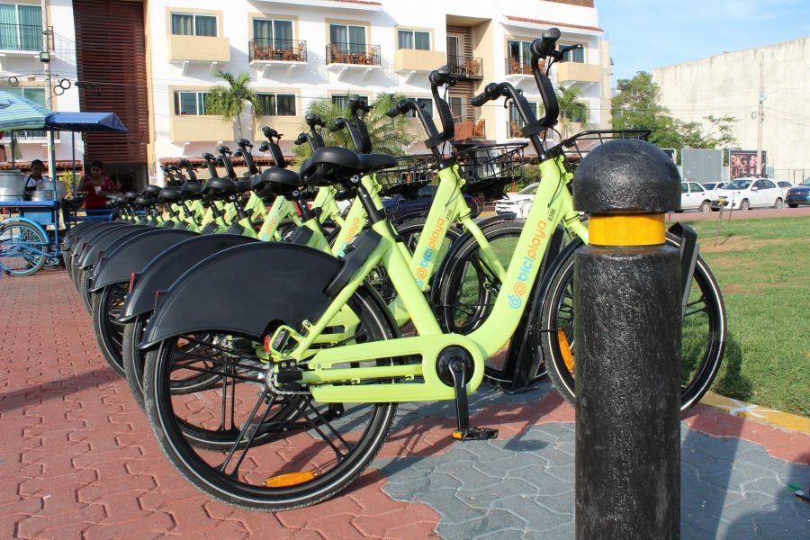 Rows of shared bicycles parked at a station in Playa del Carmen, Quintana Roo