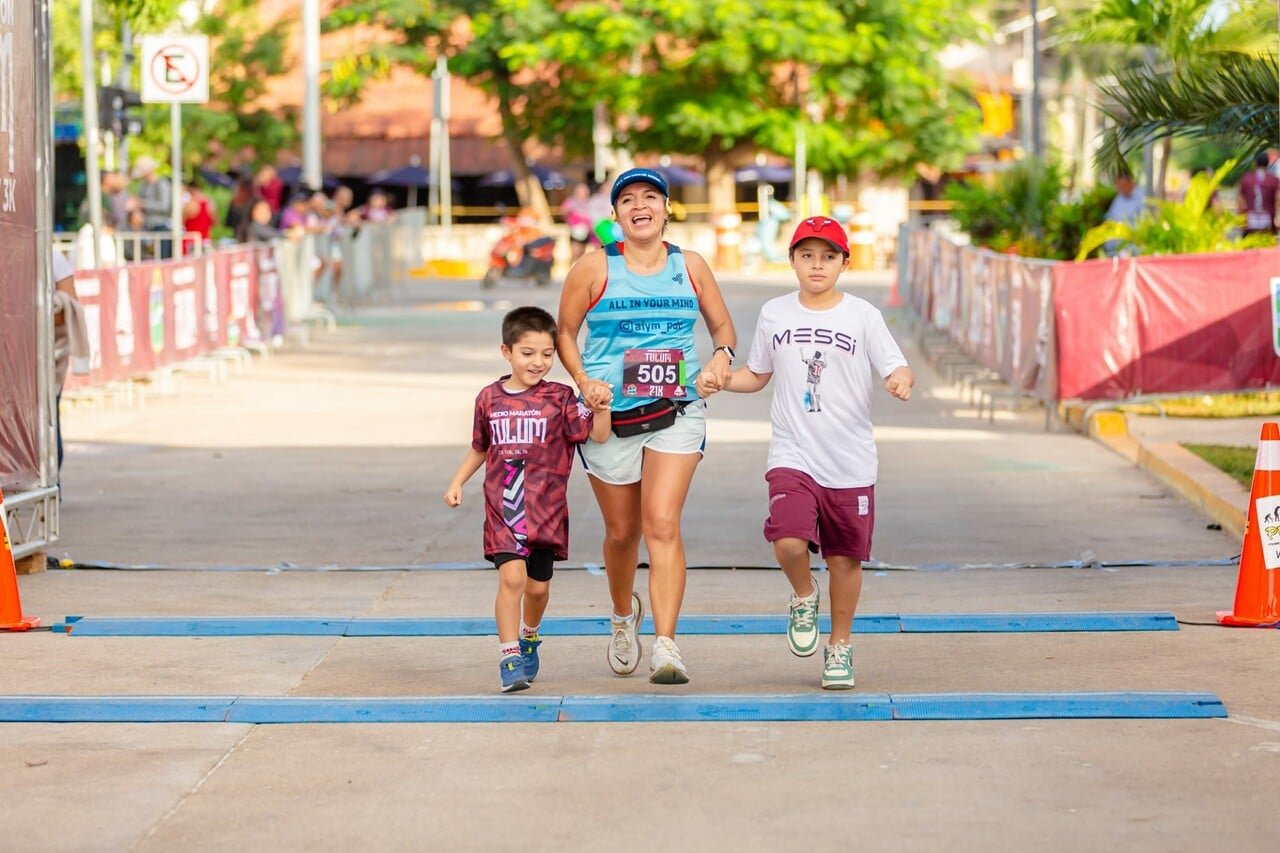Children running in the Boonil Paal kids' race in Tulum, Quintana Roo