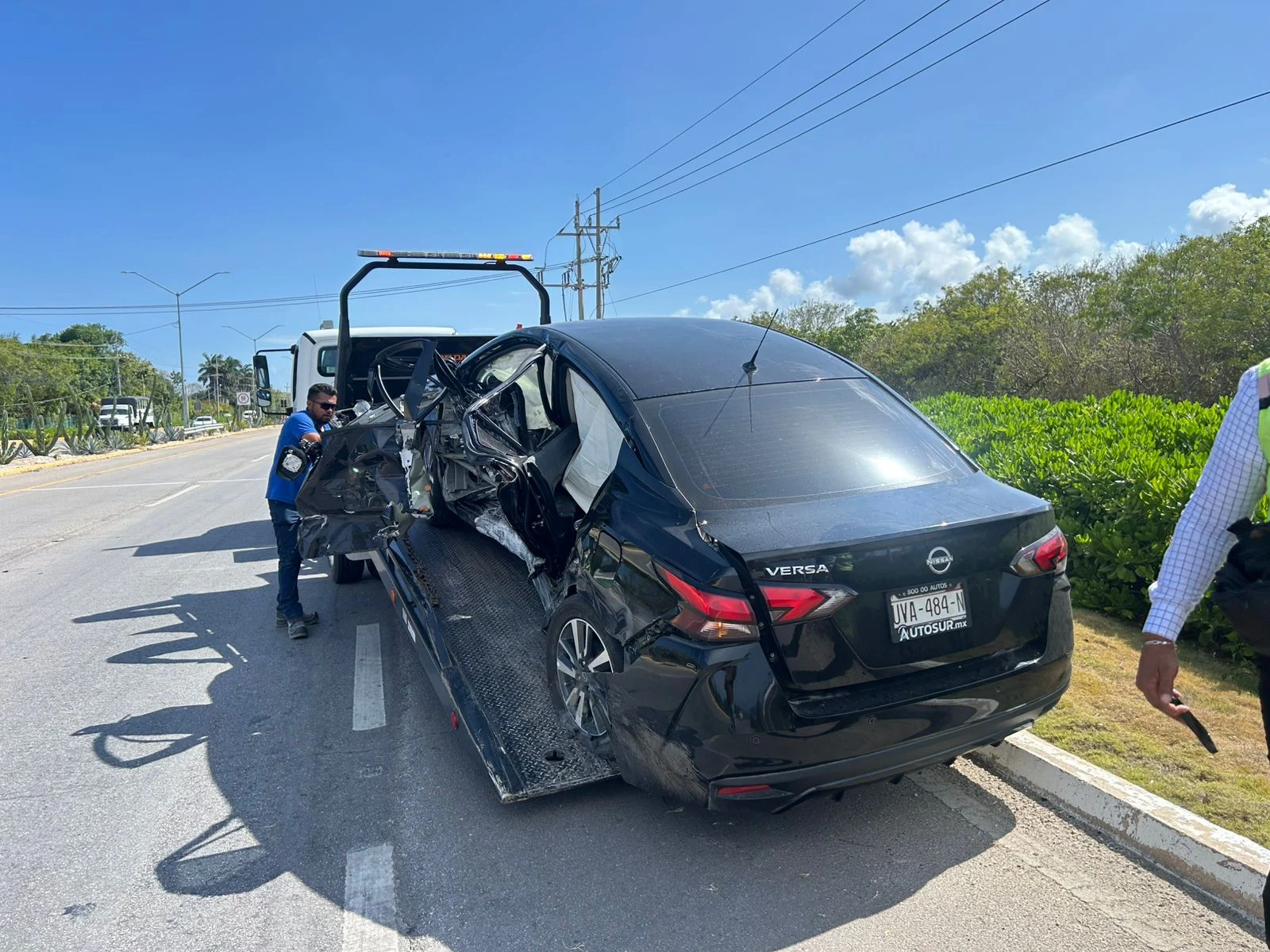 A damaged Volkswagen Vento after a crash on Highway 307 near Bahia Principe, Tulum