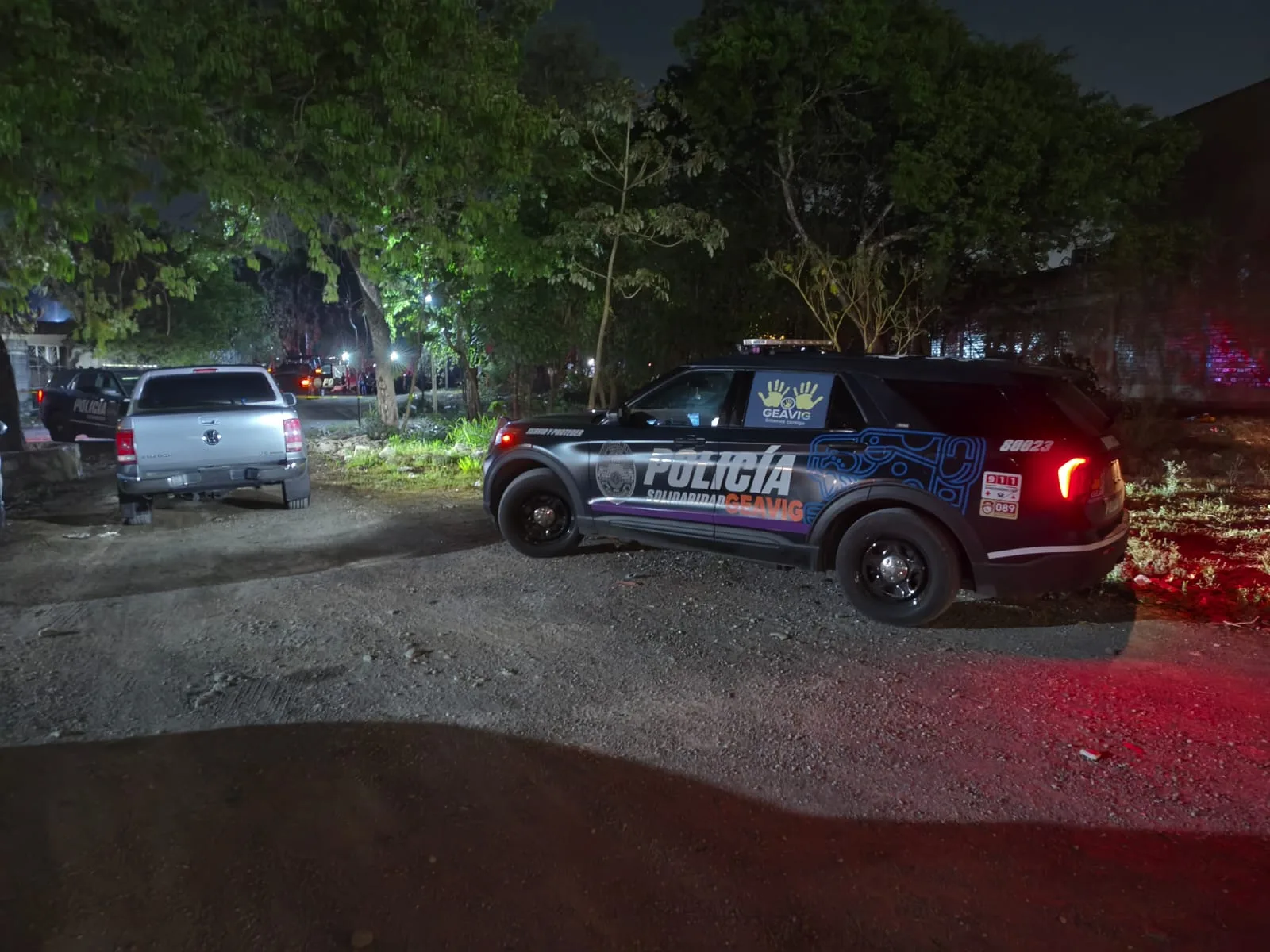 Police officers cordoning off a crime scene at the Las Torres irregular settlement in Playa del Carmen