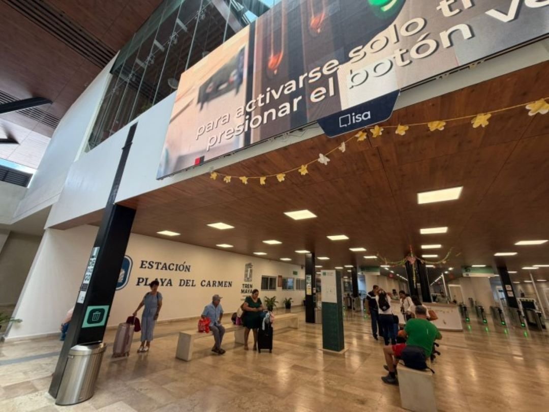 A nearly empty Maya Train station in Quintana Roo with few passengers visible
