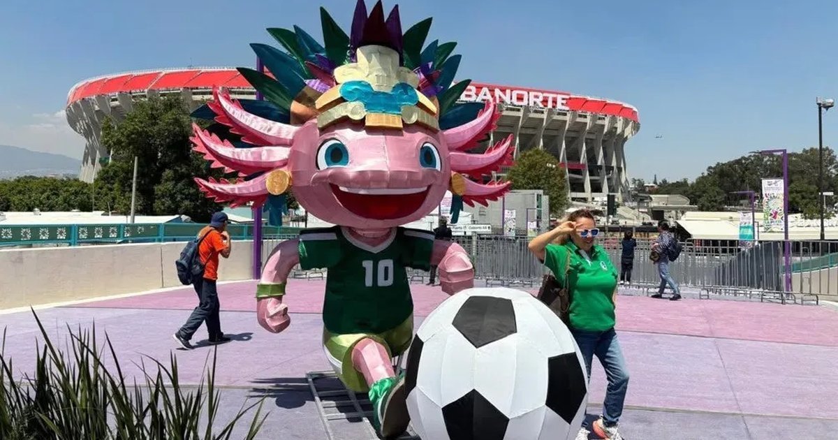 A giant purple axolotl figure installed at the entrance of Estadio Banorte in Mexico City