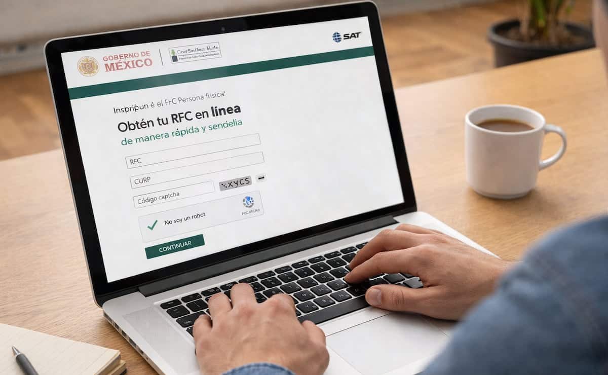 Person using laptop to access SAT portal for RFC update
