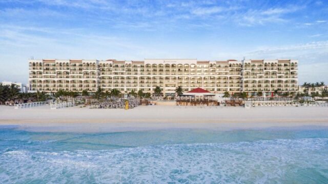 Aerial view of Hyatt Zilara Cancun resort with turquoise Caribbean Sea and lagoon