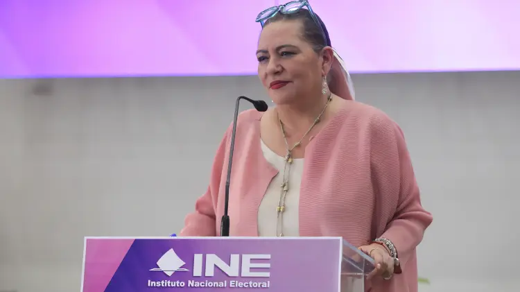 INE President Guadalupe Taddei speaking at a press conference