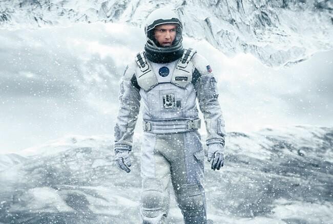 Poster for Interstellar live concert event at Teatro de Cancun featuring a space scene