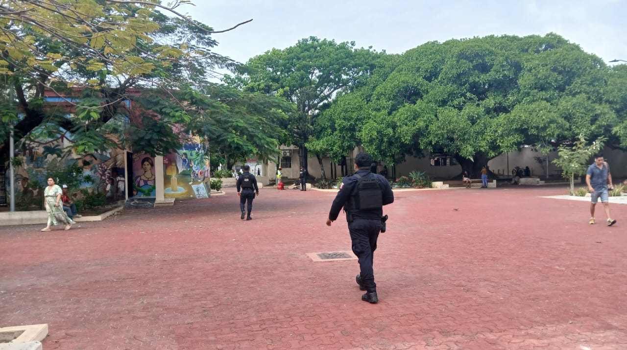 Police tape cordoning off a park area in Playa del Carmen where a body was found