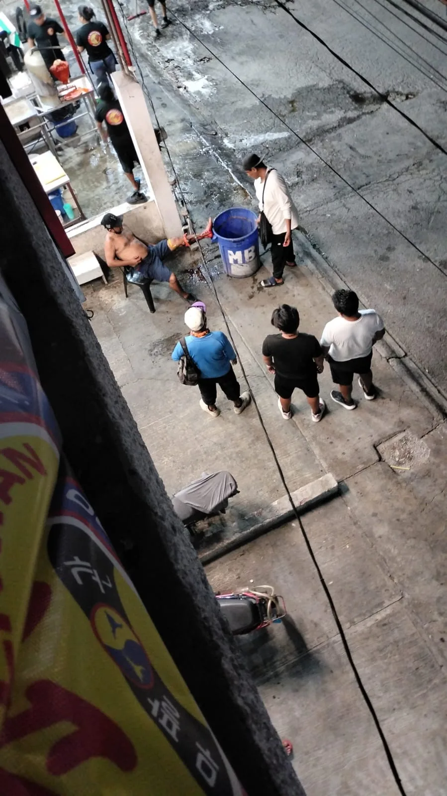 A man being attended by paramedics after a robbery in Cancun