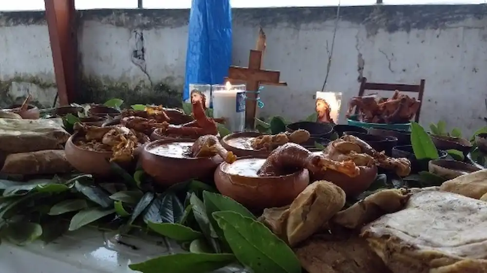 Maya priest performing the Ch'a' Cháak rain ceremony in a field in José María Morelos, Quintana Roo