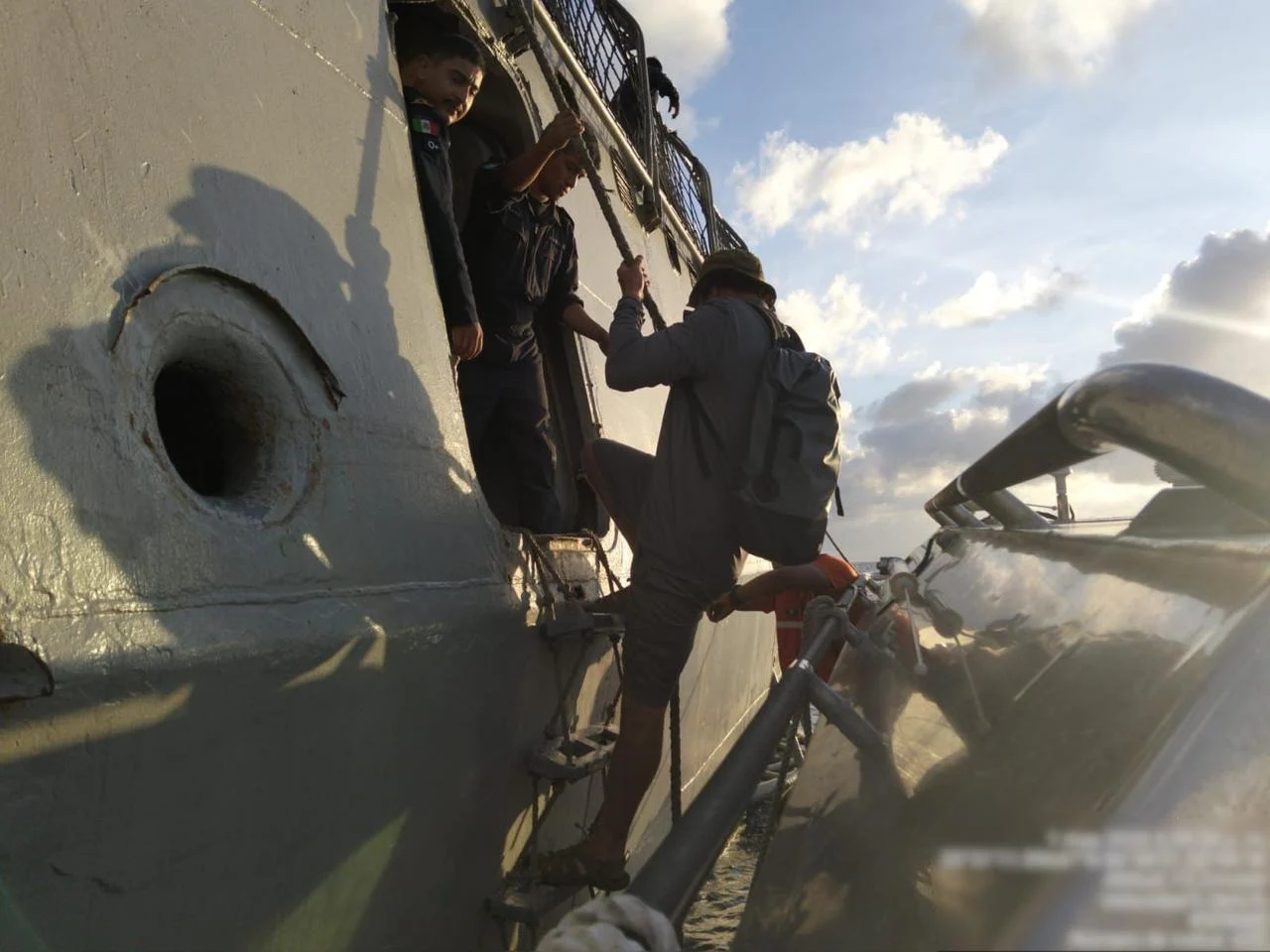 Mexican Navy vessel towing a sailboat named Breezy Lee in the Caribbean Sea near Cozumel