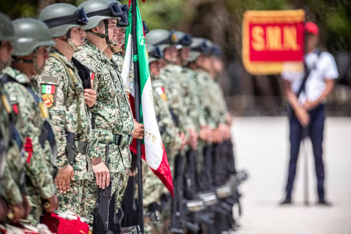 Soldiers of the National Military Service stand at attention during a flag oath ceremony in Cancun, Quintana Roo.