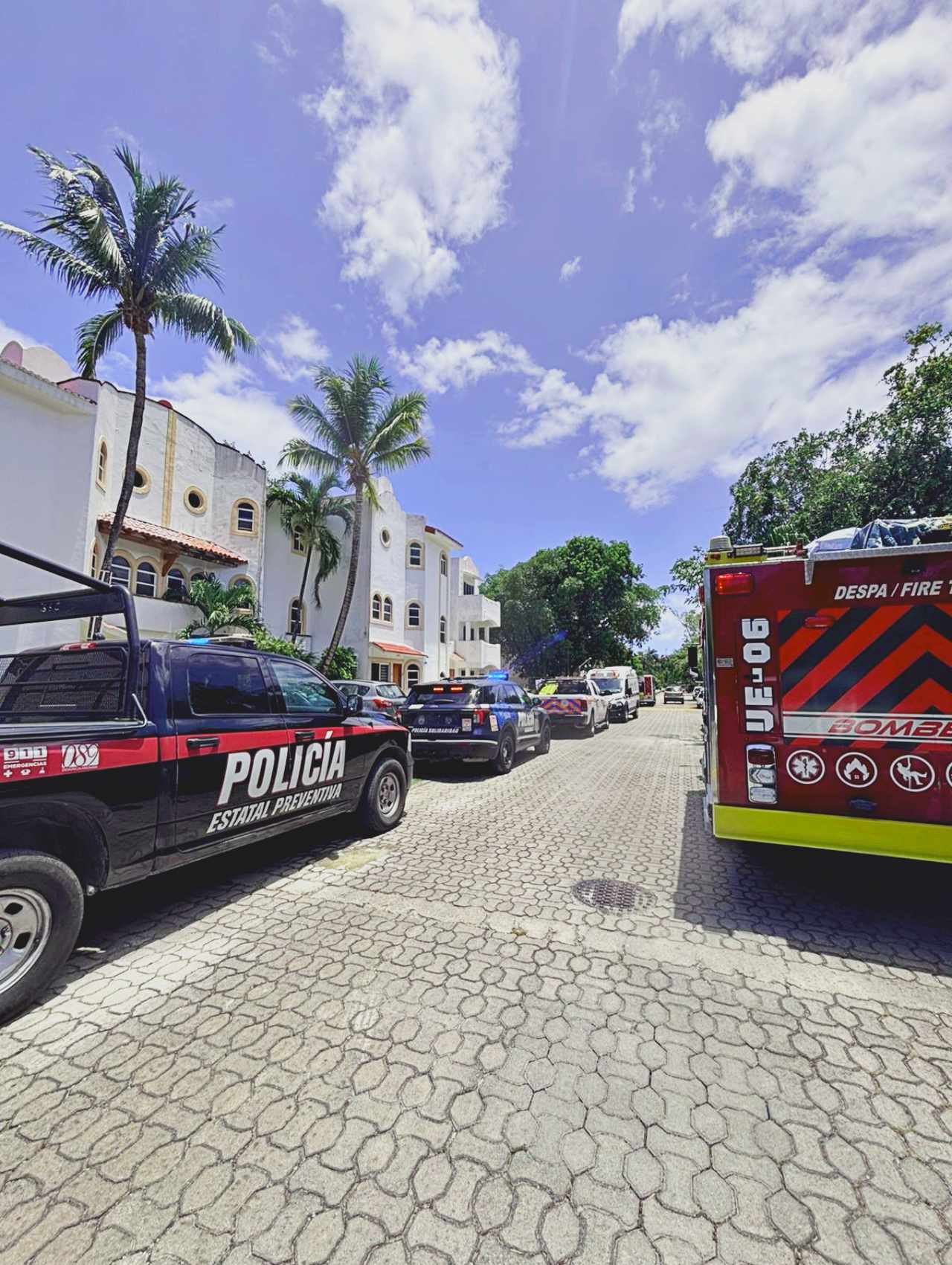 Emergency responders at the scene of a fatal drain cleaning accident in Playacar, Quintana Roo