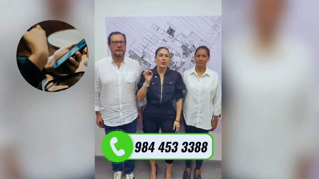 Three individuals standing in front of a wall display, with a contact number prominently displayed at the bottom of the image. One person is gesturing as they speak.$#$ CAPTION
