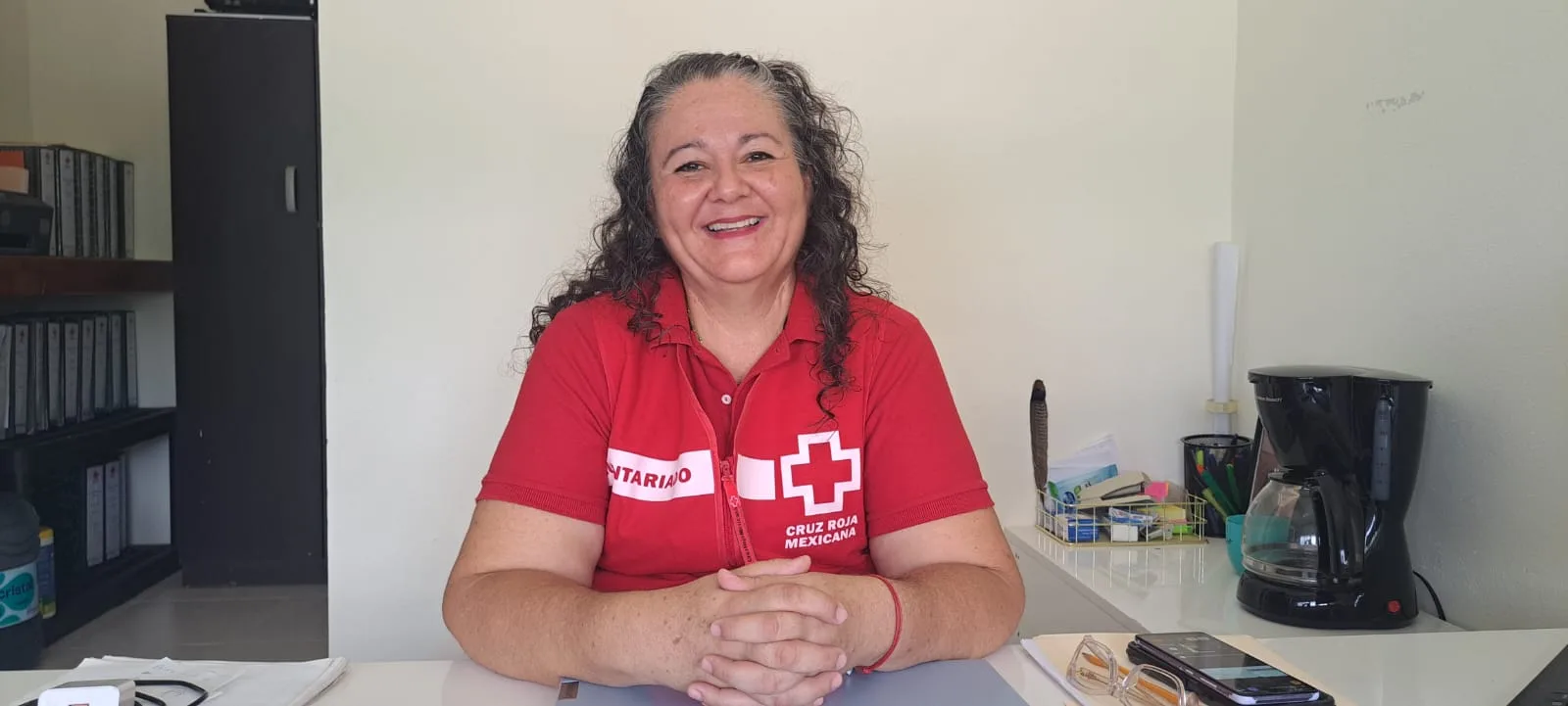 Red Cross Tulum volunteers organizing a fundraising bazaar in Tulum, Quintana Roo