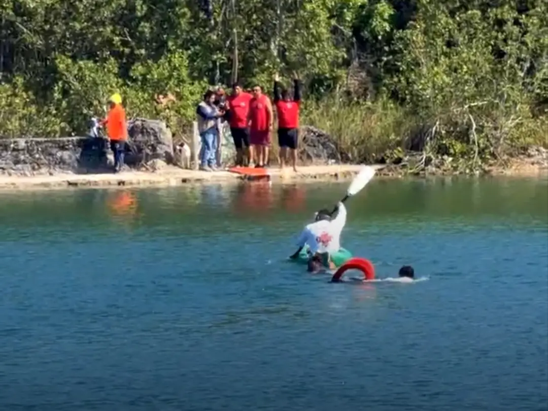 Emergency personnel and divers search the waters of Laguna ABC in Cancun for a missing teenager.