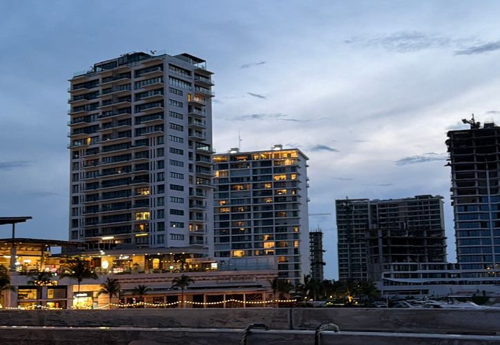 Exterior view of a high-rise residential building in Puerto Cancun, Cancun