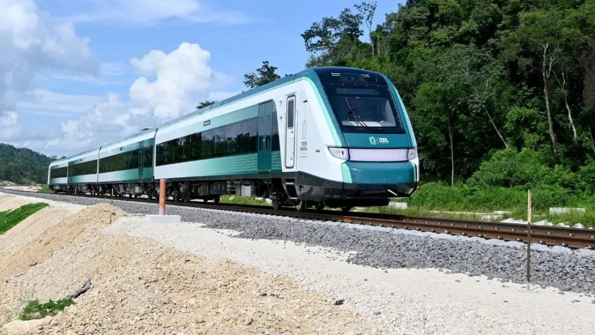 A Tren Maya passenger train travels through the jungle in Quintana Roo, Mexico.