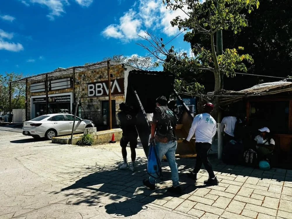 Municipal inspectors and National Guard officers at a closed establishment in Tulum's artisans zone