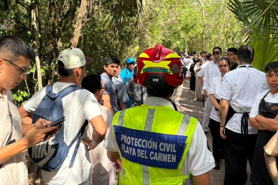 Firefighters and emergency personnel at the Xcaret Arte hotel in Playa del Carmen after a fire broke out in the underground parking electrical room.