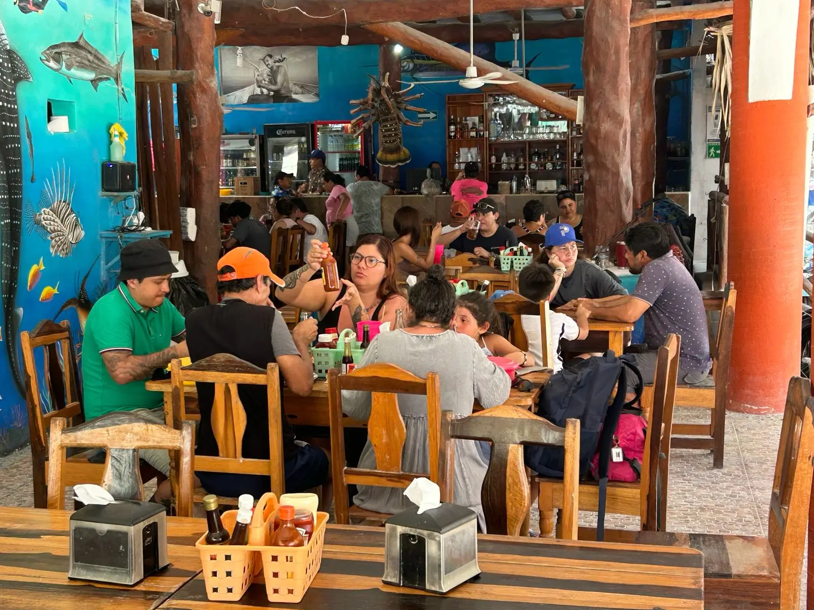 Attendees enjoying Cuban night at Yellow Festival in Holbox with music and food