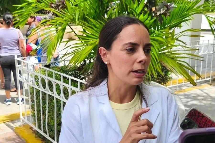 Ana Patricia Peralta speaking at a press conference in Cancun