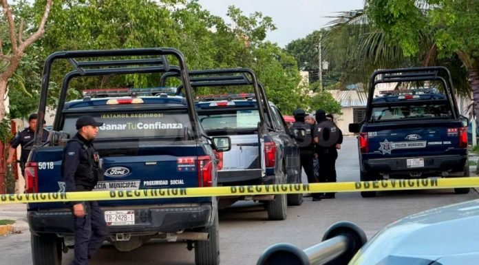 Police tape cordoning off a crime scene in Cancun