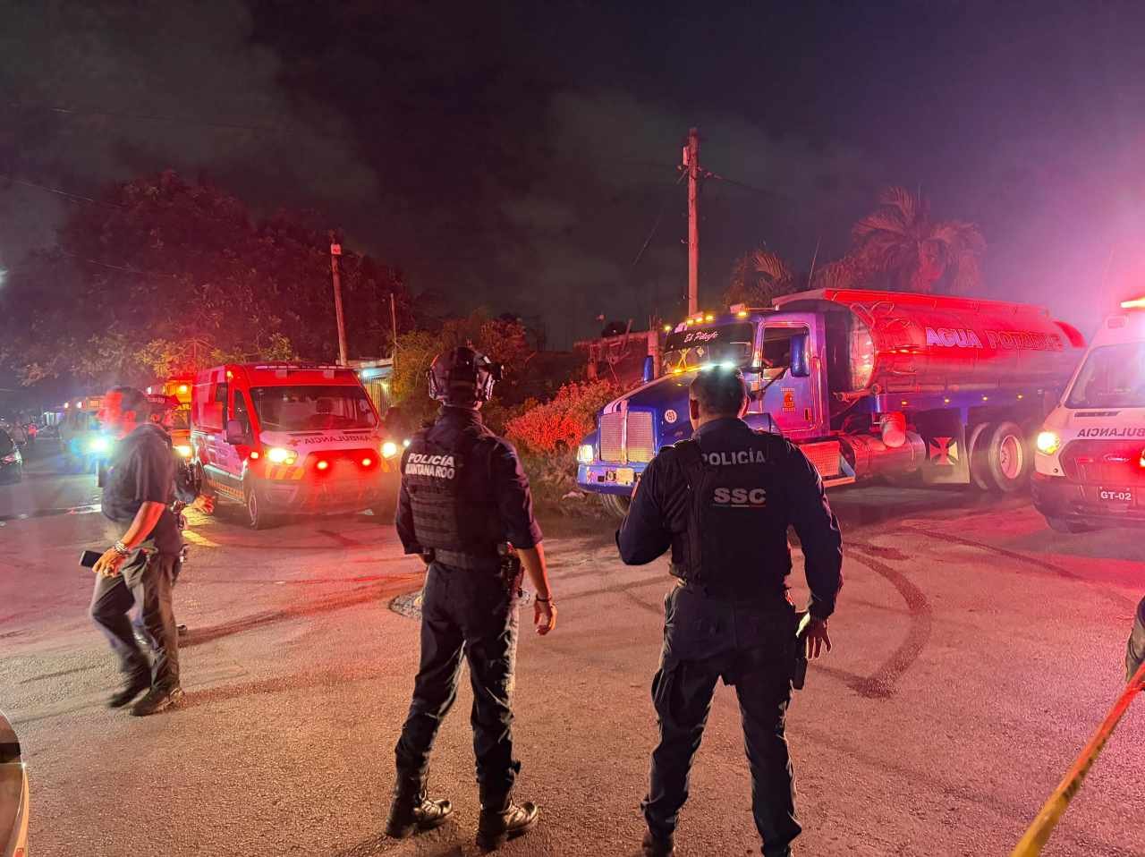 Emergency responders at the site of a house explosion in Cancun