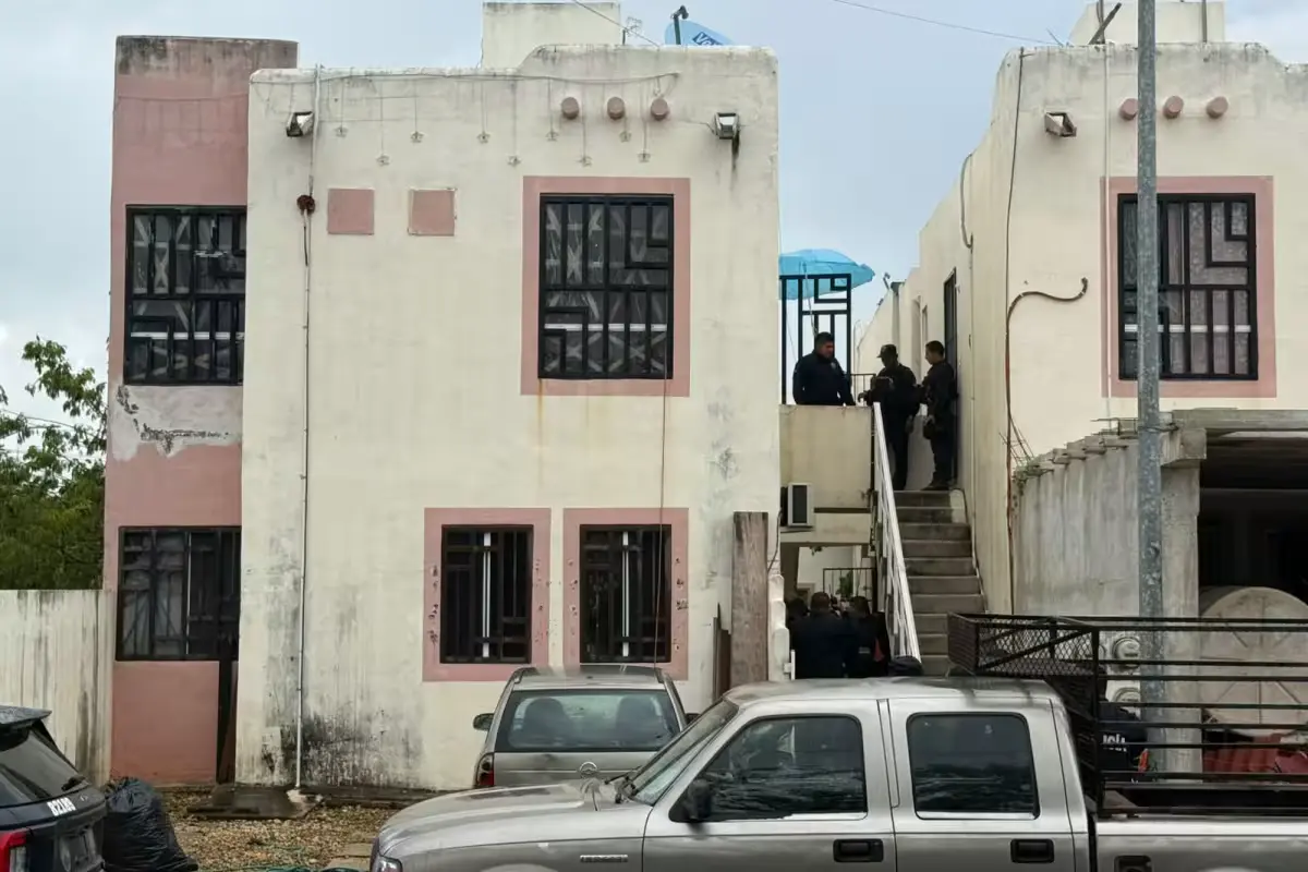 Police tape cordoning off a residential area in Cancun after a fatal stabbing