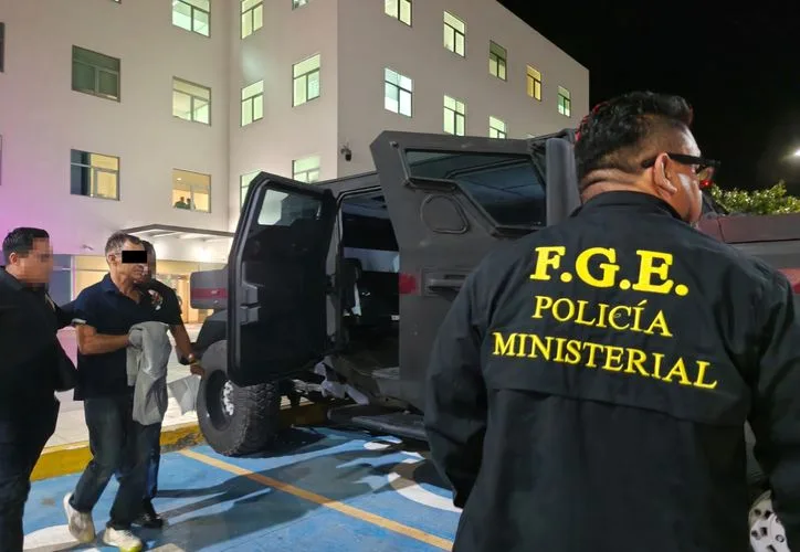 Amir N, the suspect in the Cancun residential collapse, being escorted by police