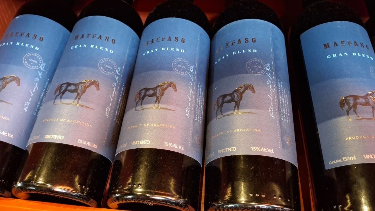 A sommelier pours wine at a tasting event in Cancun, Mexico.