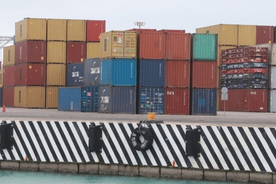 Cargo containers lined up at a customs inspection area in Quintana Roo