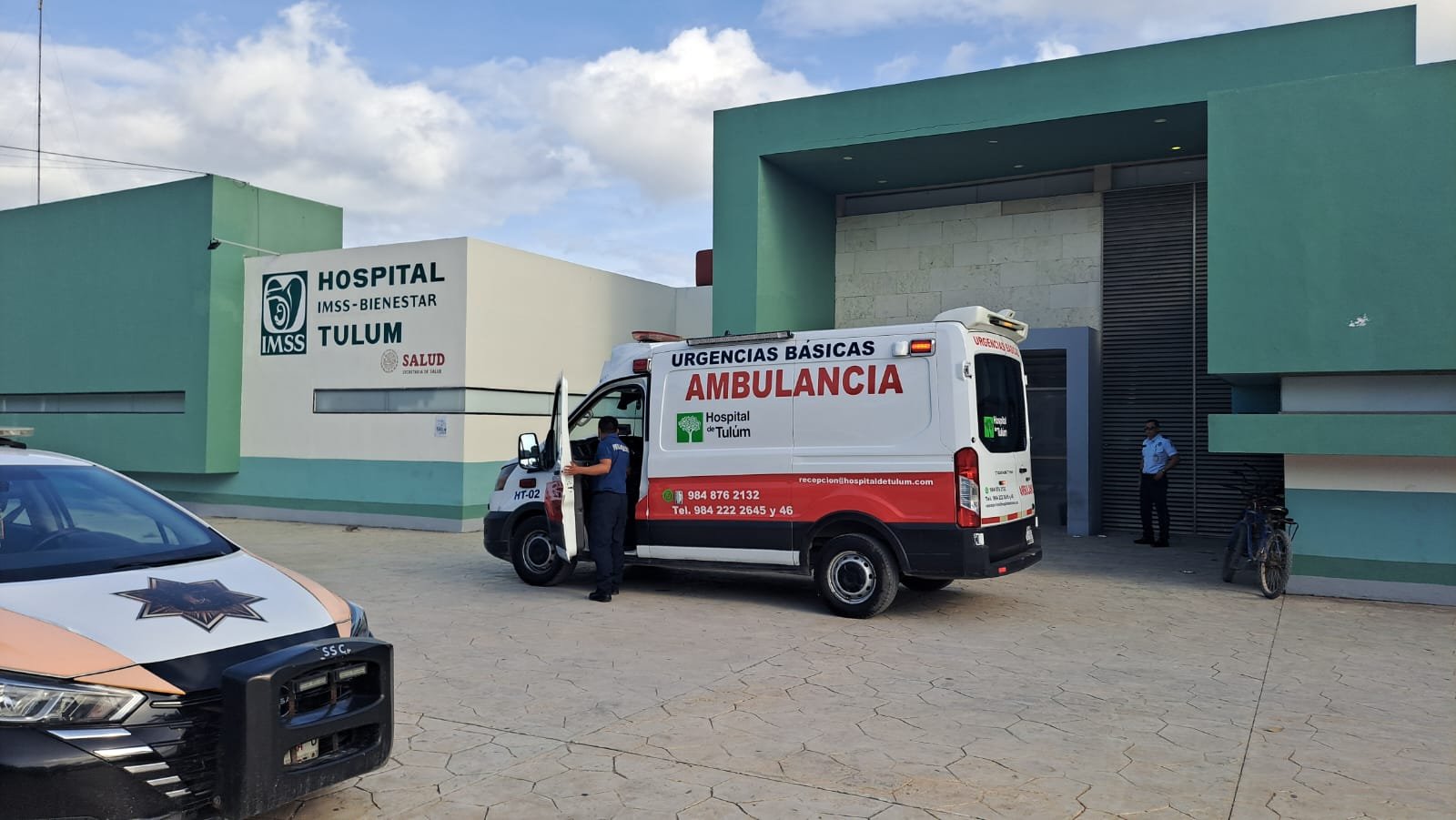 Police officers securing a crime scene on a street in Tulum after a shooting