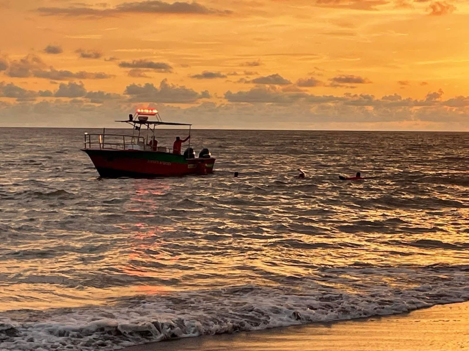 search boat on the water after crocodile kills tourist in marina vallarta