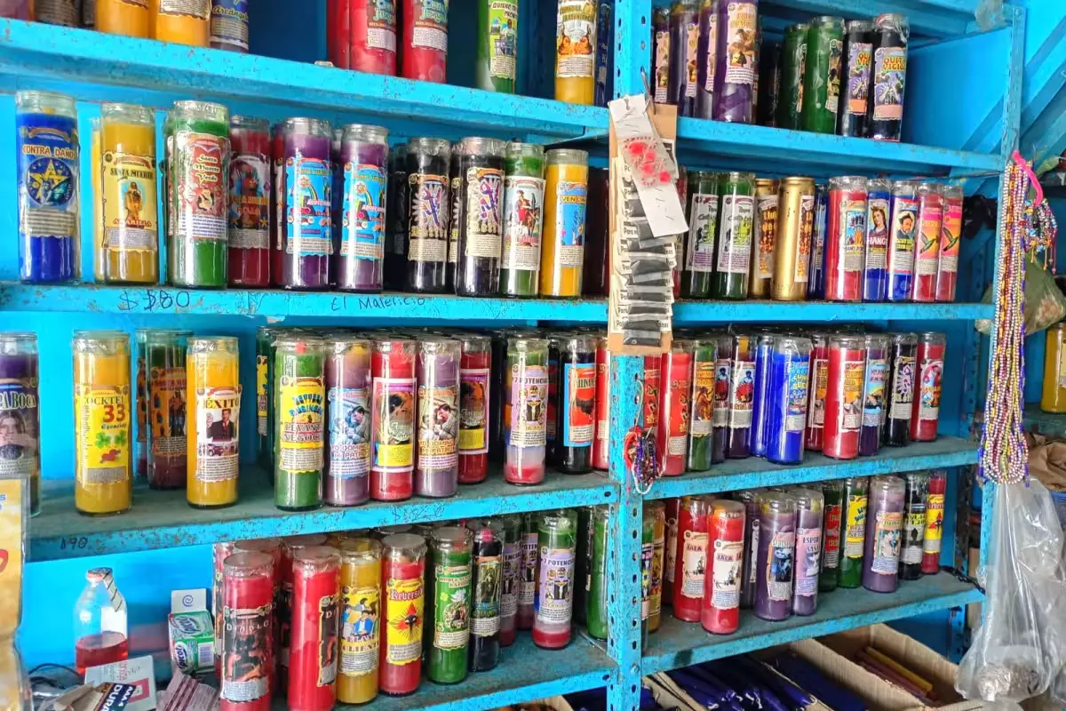 A customer browsing shelves of esoteric items in a Chetumal store