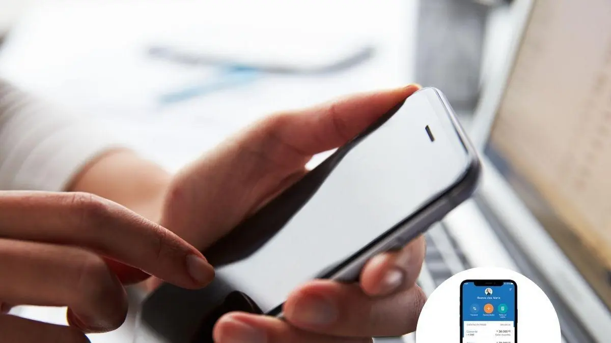 Person holding smartphone with banking app showing error message due to unregistered mobile line
