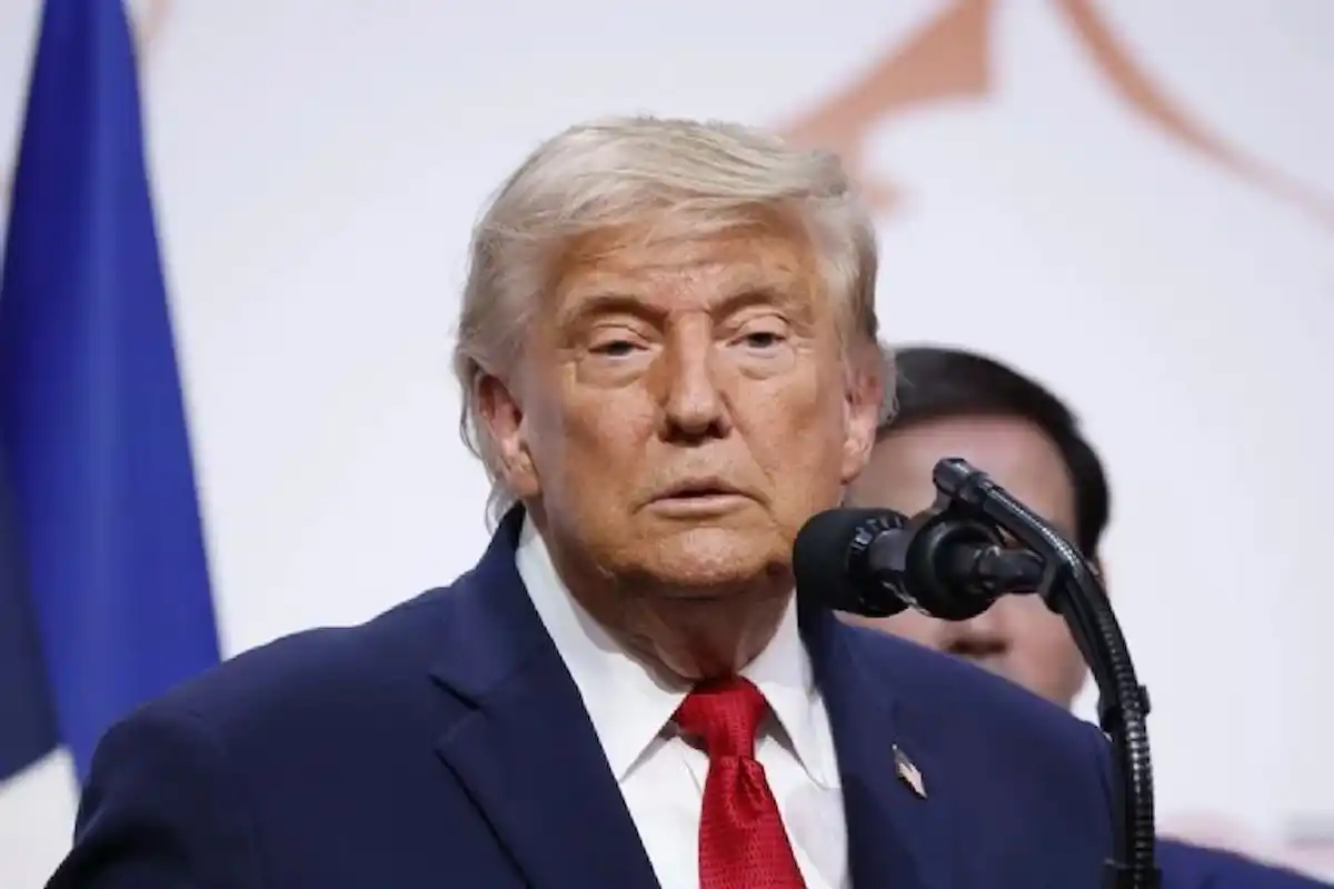 Donald Trump looking at camera with a serious expression