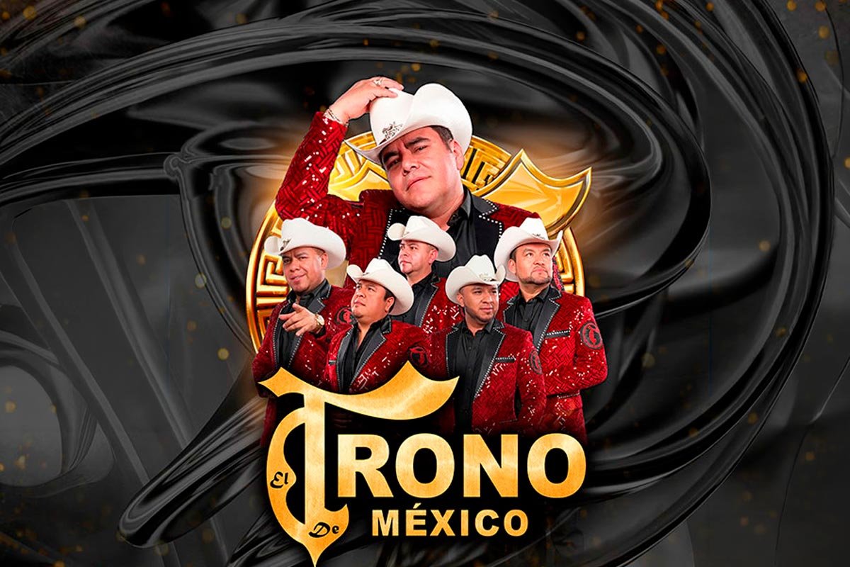 El Trono de Mexico performing on stage with band members and instruments