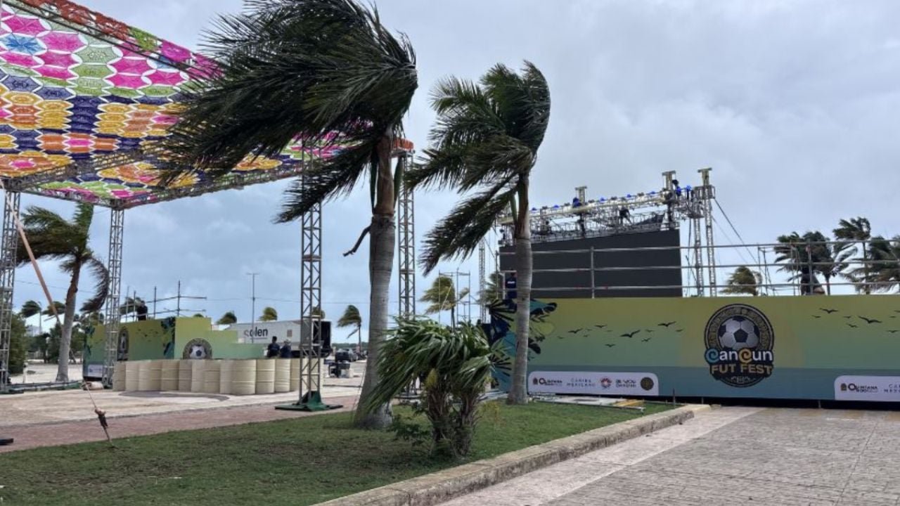 People watching a World Cup match on a giant screen at a public plaza in Cozumel