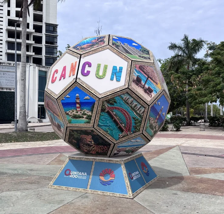 Giant soccer balls installed at Malecón Tajamar in Cancún for the 2026 FIFA World Cup