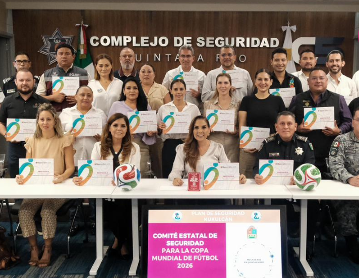 Governor Mara Lezama speaking at a podium during the presentation of the child protection protocol for the 2026 World Cup in Quintana Roo