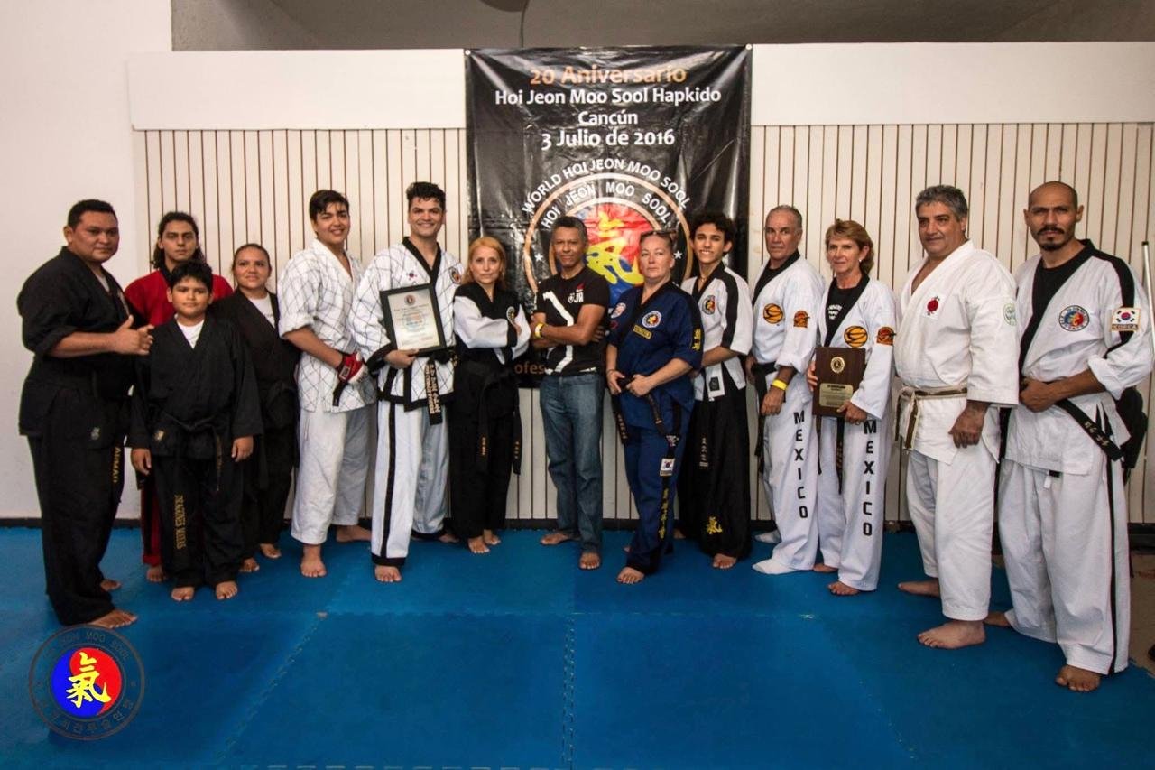 Hapkido martial artists in uniform posing during a training session in Cancun