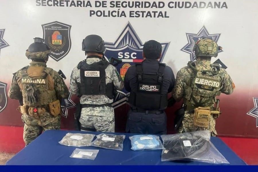 Police officers at the scene of a shooting on Holbox Island
