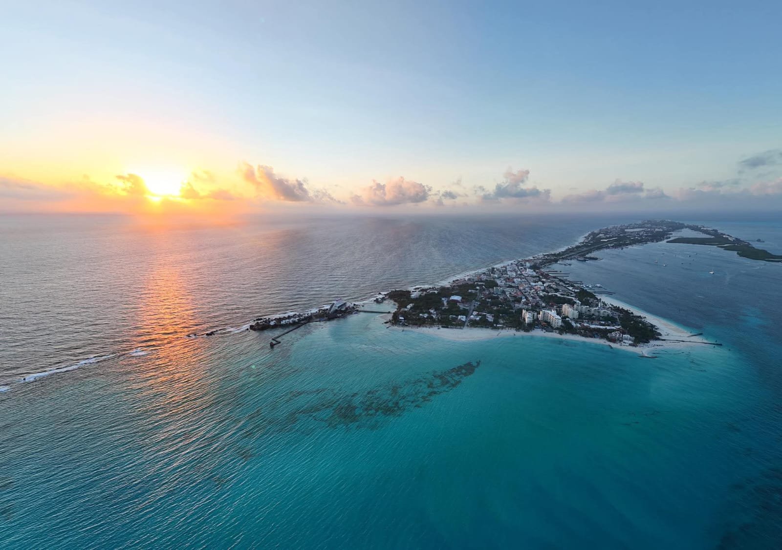 Aerial view of Isla Mujeres beach with turquoise water and white sand