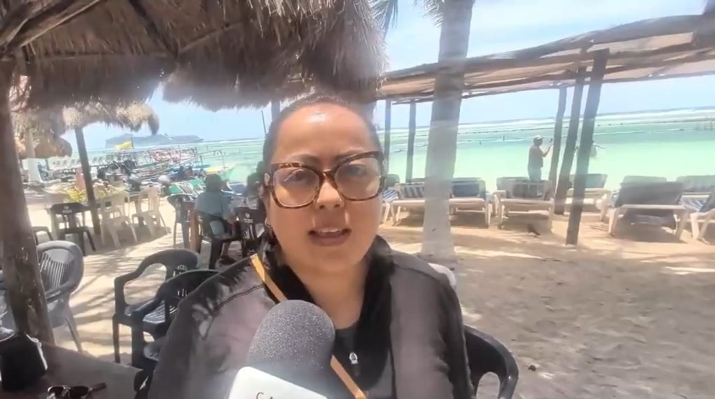 Artisans in Mahahual display handmade crafts at a local market
