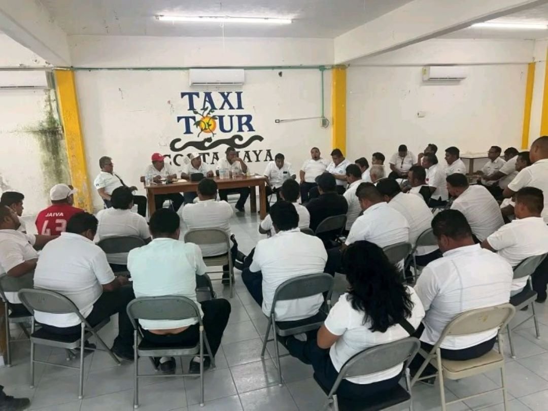Members of the Joaquin Hendricks Diaz taxi union in Mahahual during a meeting to discuss new concessions
