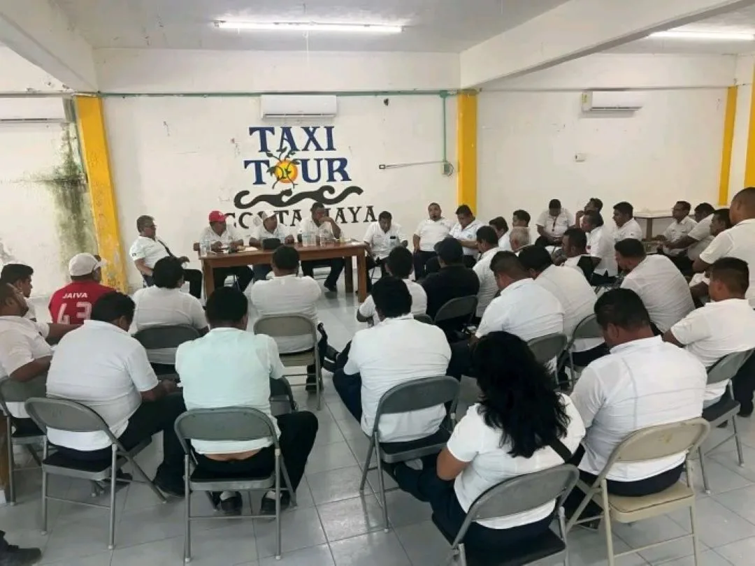 Members of the Joaquin Hendricks Diaz taxi union in Mahahual during a meeting to discuss new concessions