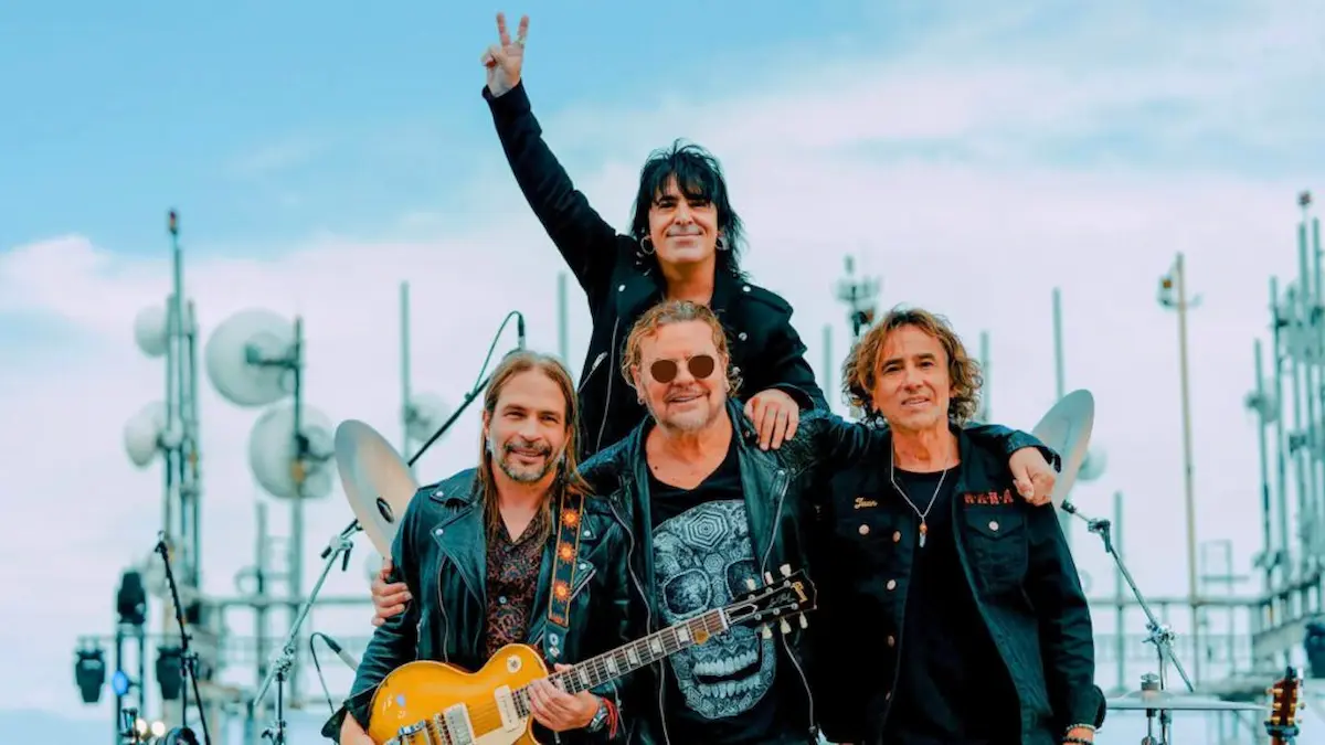 Maná band members on stage at Glorieta de la Minerva in Guadalajara during a free concert for the 2026 FIFA World Cup