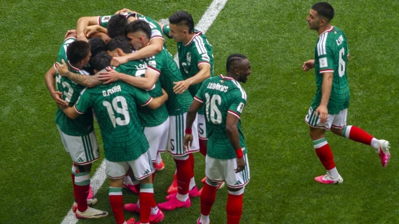 Mexico national soccer team players celebrate a goal during a World Cup 2026 match