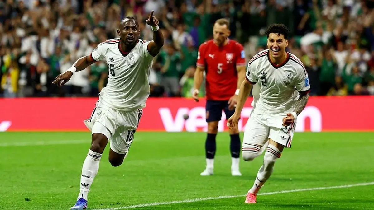 Mexico national team players celebrating after scoring a goal against the Czech Republic in the 2026 World Cup